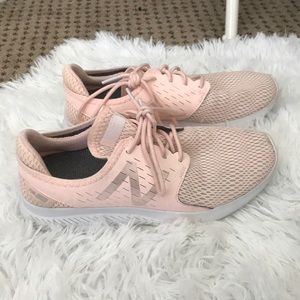 Light pink new balance tennis shoes